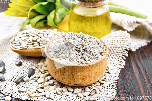 Image of Flour sunflower in bowl with oil on burlap