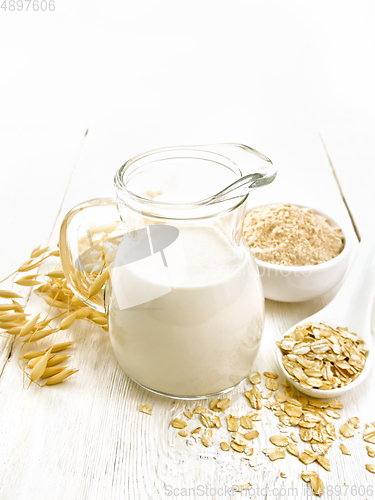 Image of Milk oatmeal in jug on white board