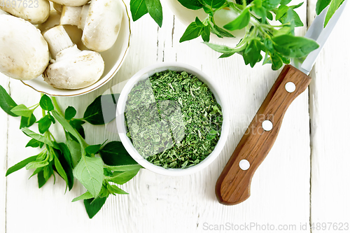 Image of Oregano dried in bowl on board top