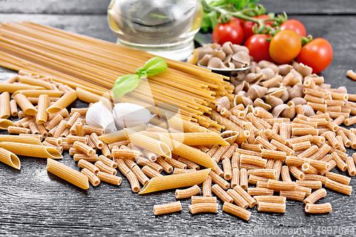 Image of Pasta different whole grain and rye on wooden board