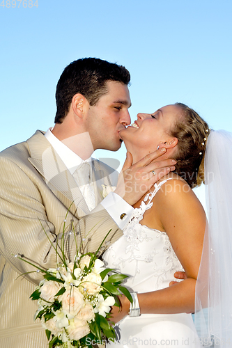 Image of Happy wedding couple smiling