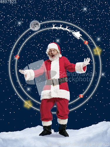 Image of Emotional Santa Claus greeting with Christmas and New Year 2021. Copyspace, design, art collage.