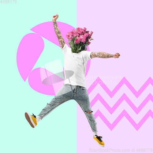 Image of Man\'s body headed by bunch of pink roses jumping on modern illustrated background. Contemporary art collage.