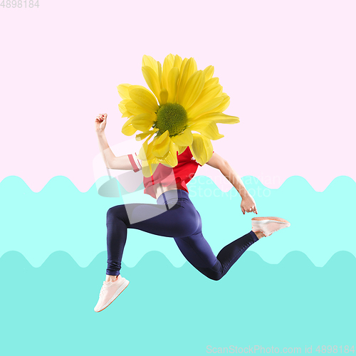 Image of Jumping woman\'s body in sportswear headed by yellow flower on modern illustrated background. Contemporary art collage.