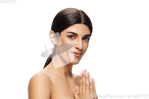 Image of Portrait of beautiful jewish woman isolated on white studio background. Beauty, fashion, skincare, cosmetics concept.