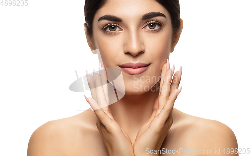 Image of Portrait of beautiful jewish woman isolated on white studio background. Beauty, fashion, skincare, cosmetics concept.