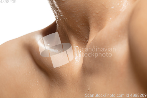 Image of Close-up beautiful jewish woman\'s neck isolated on white studio background. Beauty, fashion, skincare, cosmetics concept.