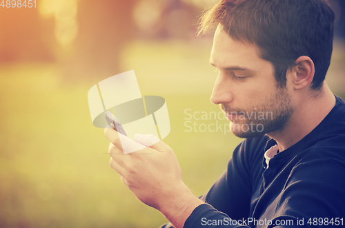 Image of Man with smart phone
