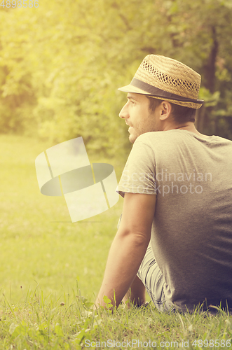 Image of Man sitting in the park