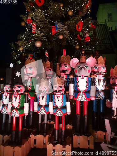 Image of Wooden nutcracker statues standing in a row as a Christmas decor