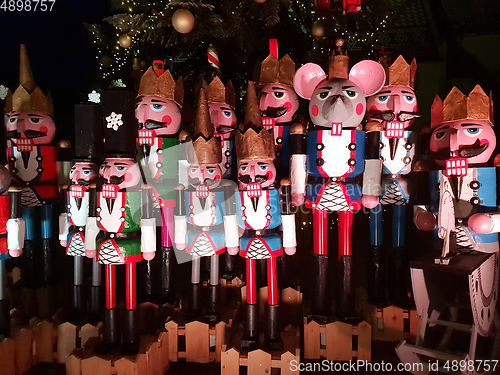 Image of Wooden nutcracker statues standing in a row as a Christmas decor