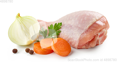 Image of fresh raw chicken leg and vegetables