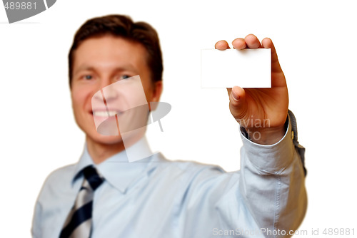 Image of Businessman holding a white card,clipping path included