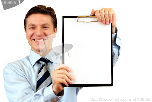 Image of Businessman holding a blank clipboard,clipping path included