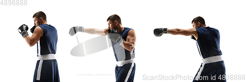 Image of Young boxer against white studio background in motion of step-to-step kicking