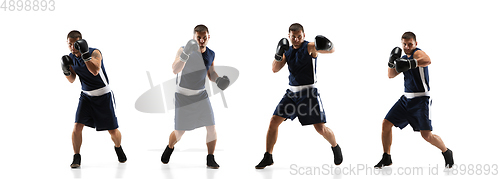 Image of Young boxer against white studio background in motion of step-to-step kicking