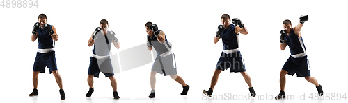 Image of Young boxer against white studio background in motion of step-to-step kicking