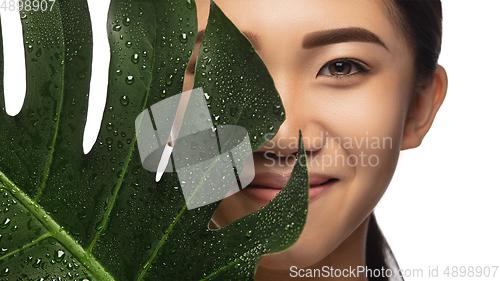 Image of Portrait of beautiful asian woman isolated on white studio background. Beauty, fashion, skincare, cosmetics concept.