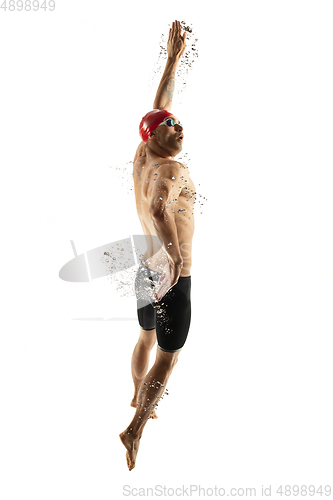 Image of Caucasian professional sportsman, swimmer training isolated on white studio background