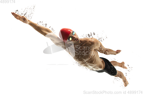 Image of Caucasian professional sportsman, swimmer training isolated on white studio background