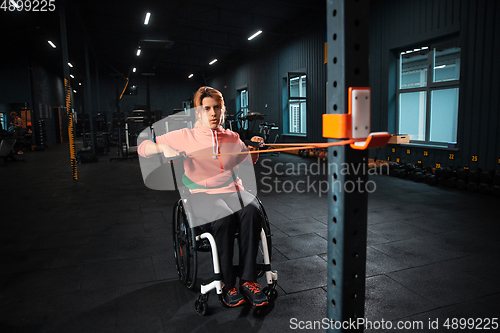 Image of Disabled woman training in the gym of rehabilitation center