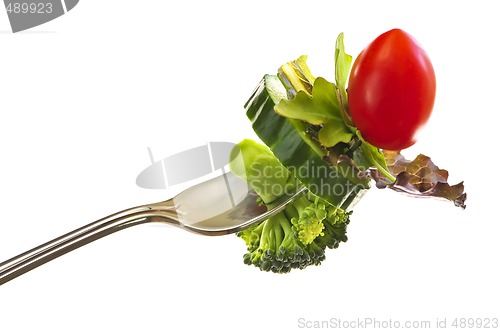 Image of Fresh vegetables on a fork