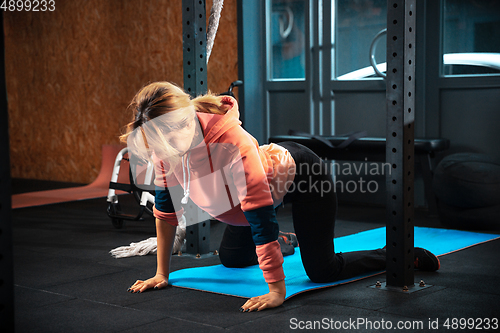 Image of Disabled woman training in the gym of rehabilitation center