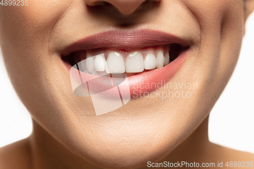 Image of Close-up shoot of beautiful female lips with natural lipstick make up