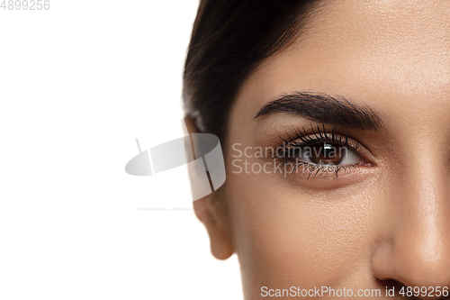 Image of Portrait of beautiful jewish woman isolated on white studio background. Beauty, fashion, skincare, cosmetics concept.