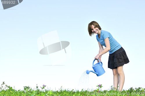 Image of Girl with watering can