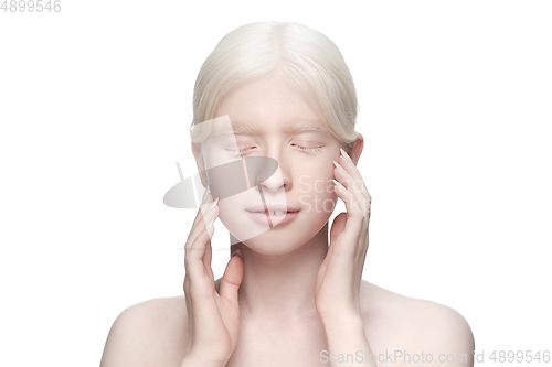 Image of Portrait of beautiful albino woman isolated on white studio background. Beauty, fashion, skincare, cosmetics concept.