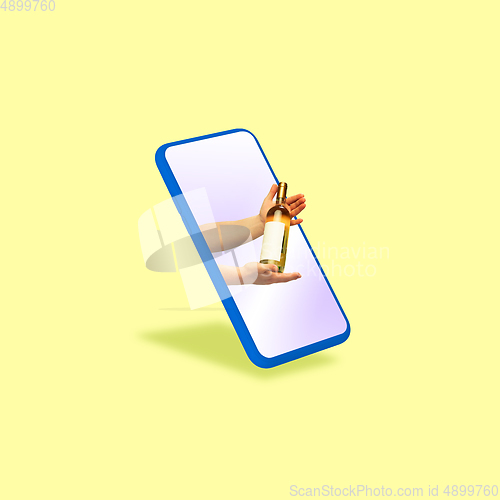 Image of Handsome delivery man giving order right from smartphone\'s screen, fast delivery concept