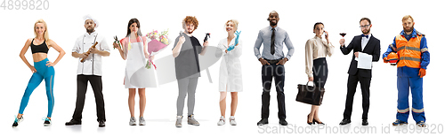 Image of Group of people with different professions isolated on white studio background, horizontal