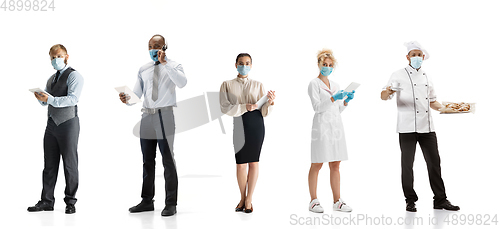 Image of Group of people with different professions isolated on white studio background, horizontal