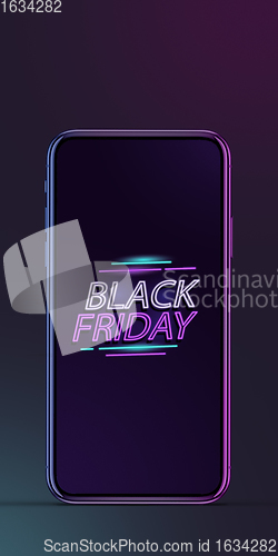 Image of Device with neon lettering, black friday, sales concept. Flyer with copyspace. Dark neoned background