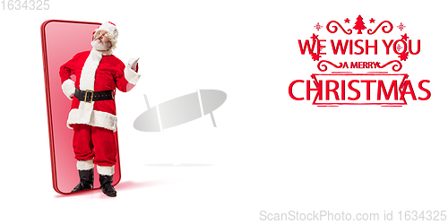 Image of Emotional Santa Claus greeting with New Year 2021 and Christmas. Flyer with copyspace