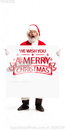 Image of Emotional Santa Claus greeting with New Year 2021 and Christmas. Flyer with copyspace