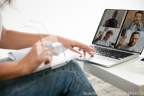 Image of Remote working from home. Workplace in home office with PC, devices and gadgets.