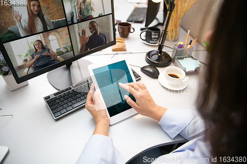 Image of Remote working from home. Workplace in home office with PC, devices and gadgets.