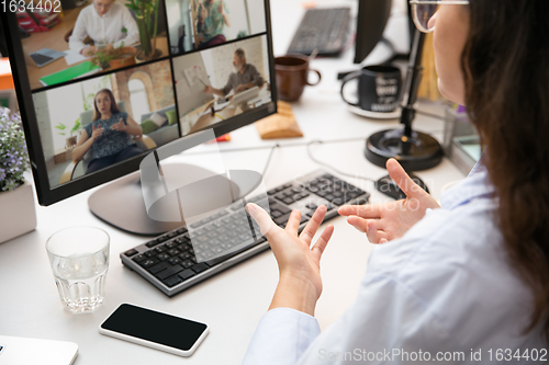 Image of Remote working from home. Workplace in home office with PC, devices and gadgets.