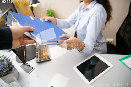 Image of Remote working from home. Workplace in home office with PC, devices and gadgets.