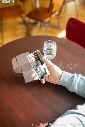 Image of Remote working. Workplace in bar, restaurant office with PC, devices and gadgets.