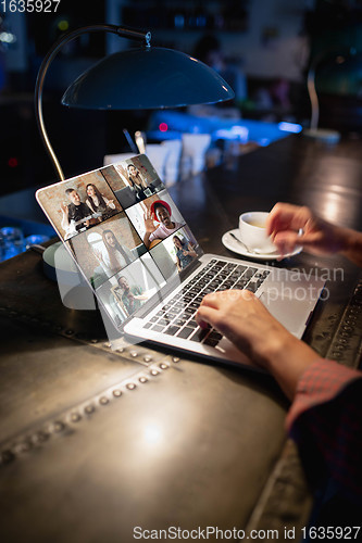Image of Remote working. Workplace in bar, restaurant office with PC, devices and gadgets.