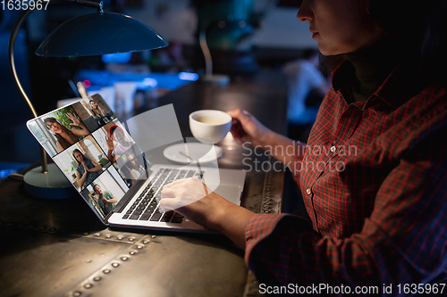 Image of Remote working. Workplace in bar, restaurant office with PC, devices and gadgets.