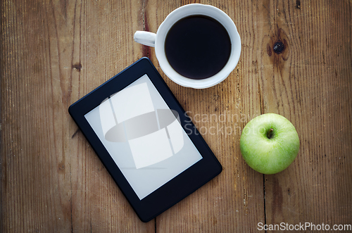 Image of E-book reader and coffee