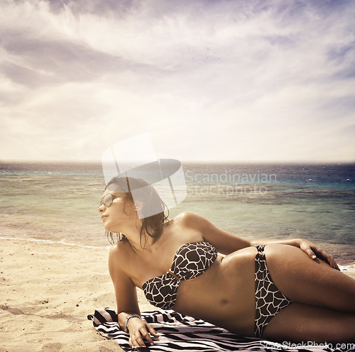 Image of Woman on the beach