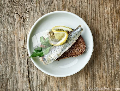 Image of plate of sandwich with canned sardine