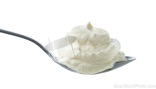 Image of spoon of cream cheese