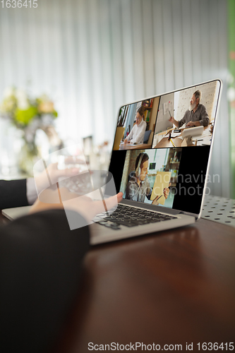 Image of Remote working. Workplace in bar, restaurant office with PC, devices and gadgets.