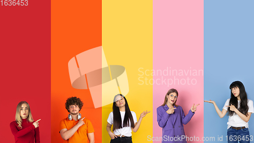 Image of Young people pointing at sides on multicolored background. Human emotions, facial expression concept. Trendy colors. Creative collage.